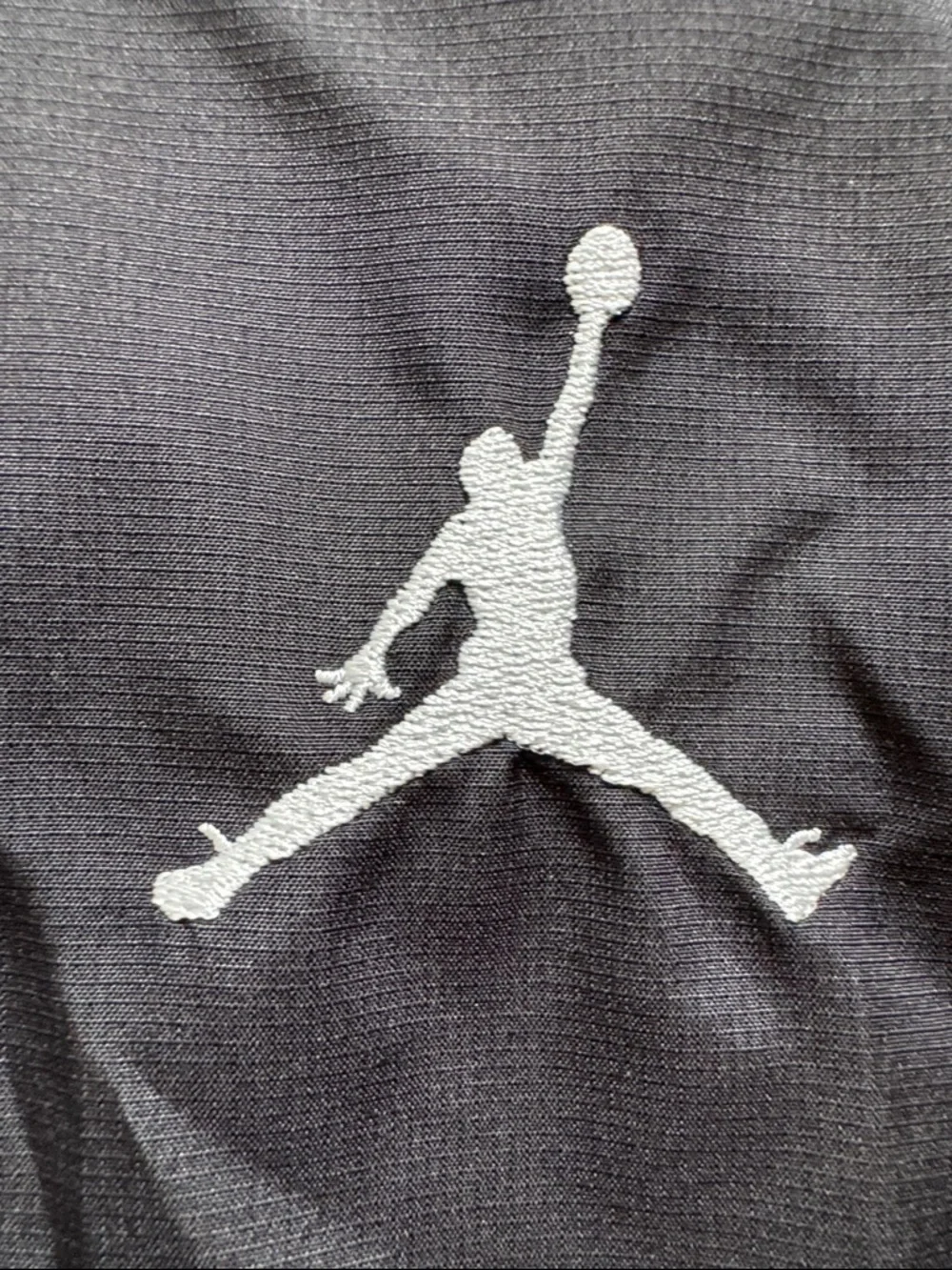Air Jordan Black, hooded Windbreaker Jacket with Neon Zip. Youth Size XL